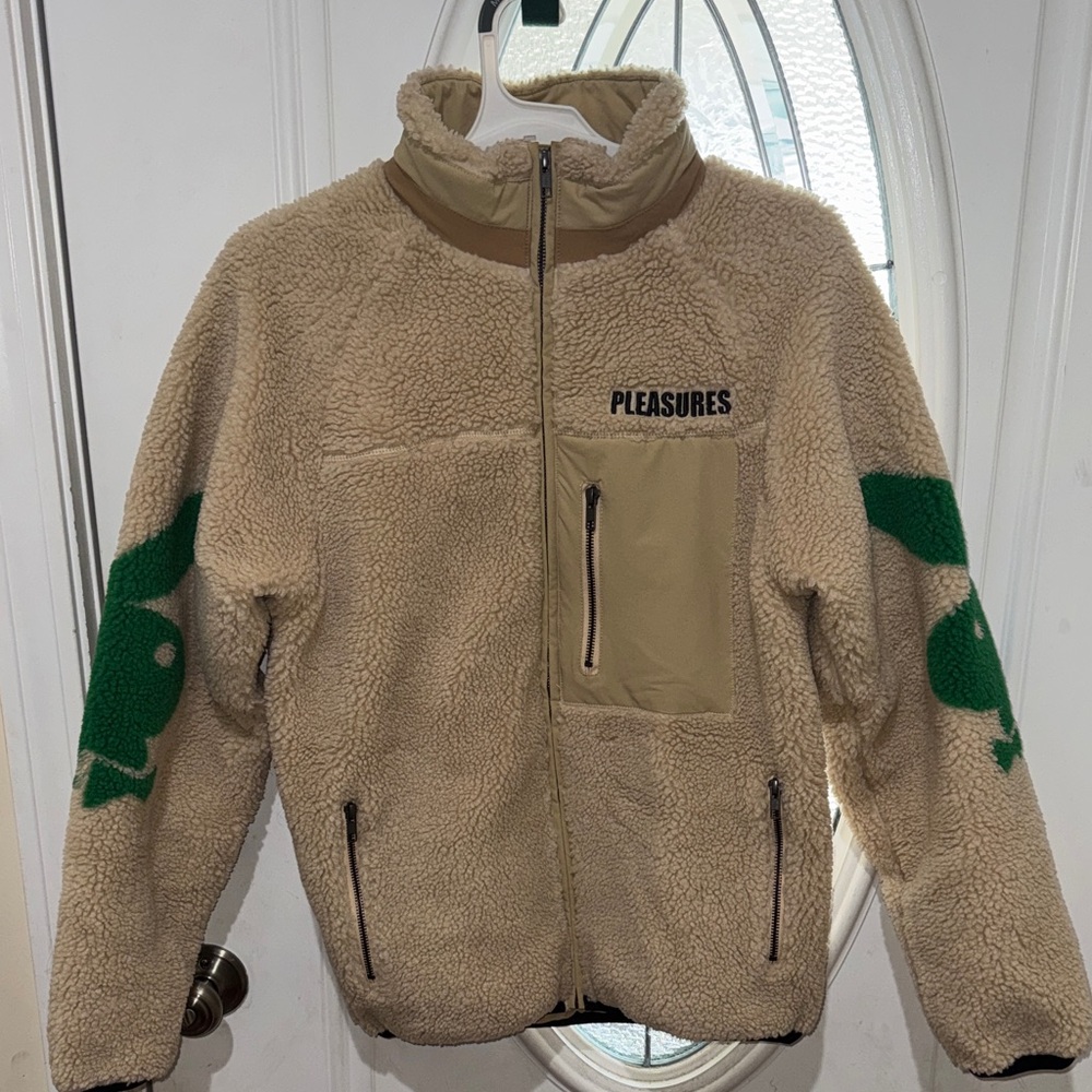 Unisex Playboy Pleasures Beige Sherpa Jacket with Green PB Bunny Sleeve Graphics
